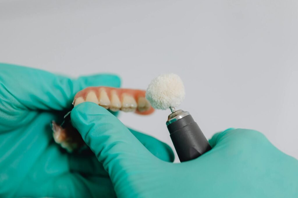 Illustration of Implants vs Dentures Jaipur: Stunning Solutions for Missing Teeth at EnamelD Clinic